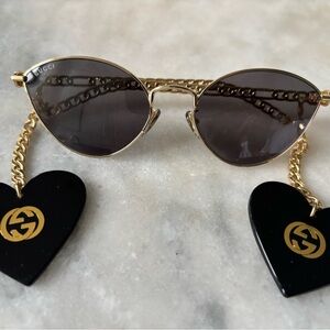Gucci Cat-Eye Gold Sunglasses with Detachable Heart Charms